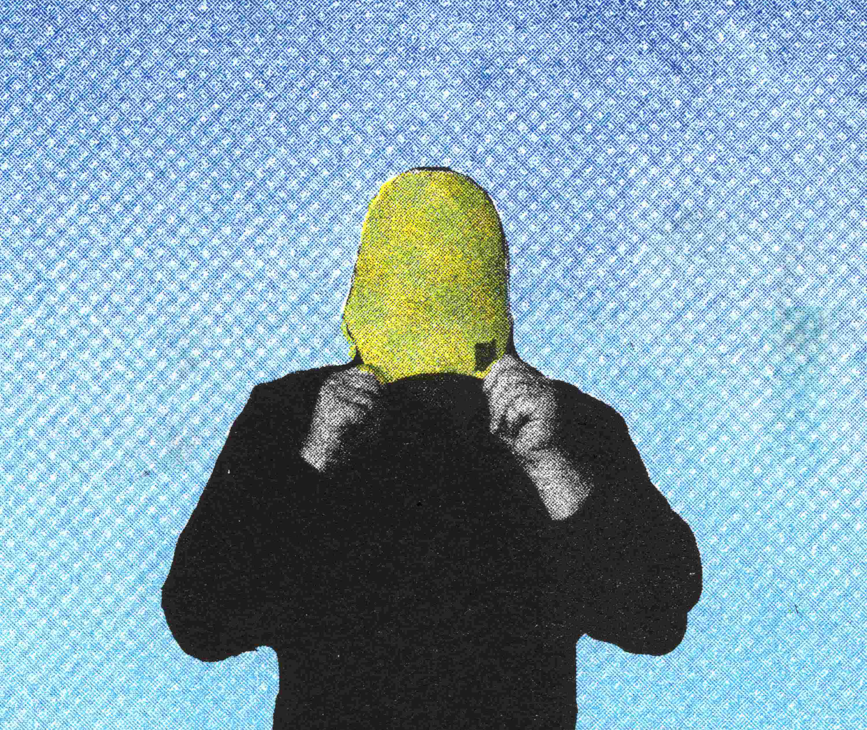 a photograph of LNSY pulling a beanie over their heads